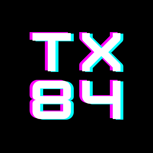 The logo of Torattox84 stylized as a white TX above an 84 on a black background.